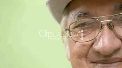 Elderly people portrait, happy old man with hat and eyeglasses