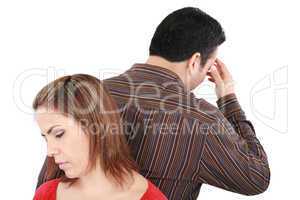 Young couple standing back to back having relationship difficult