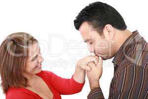 Husband kissing hand of smiling wife