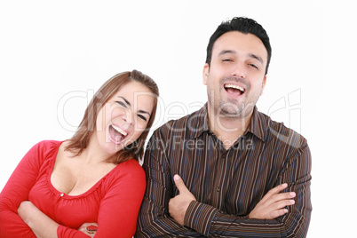 Portrait of an excited young couple on white background