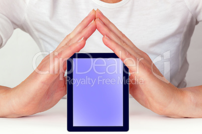 Hands holding a tablet pc