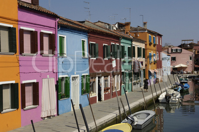 the canals in Burano an island near Venice Italy