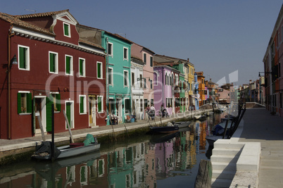 the canals in Burano an island near Venice Italy