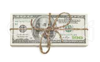 Stack of One Hundred Dollar Bills Tied in a Burlap String on Whi