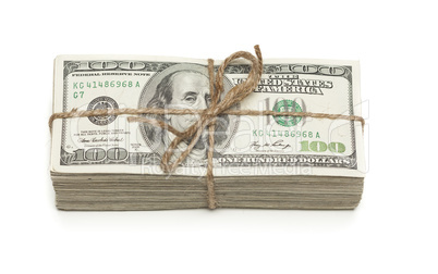 Stack of One Hundred Dollar Bills Tied in a Burlap String on Whi
