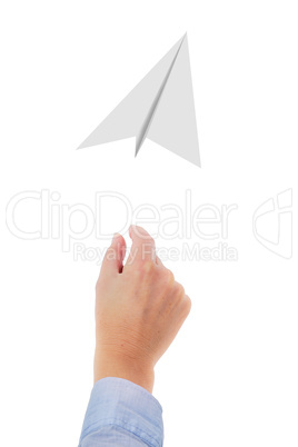 Hand throwing paper airplanes in the air