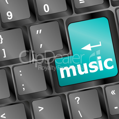 Computer keyboard with music key - technology background
