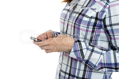 Cropped image of a girl in checked sending messages