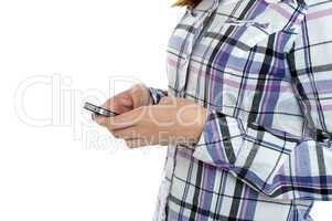 Cropped image of a girl in checked sending messages