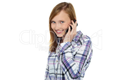Pretty girl talking to her boyfriend on mobile