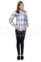 Trendy girl with long hair posing smartly