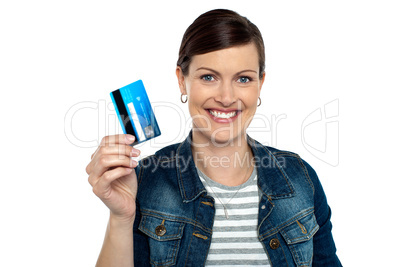 Shopaholic woman showing cash card
