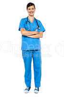 Smart looking female doctor, arms folded