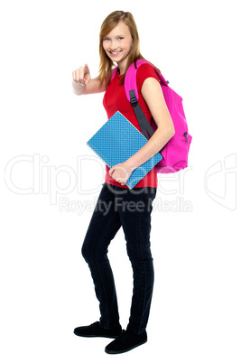 Trendy high school girl pointing at you