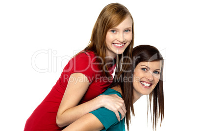 Mother piggybacks her teenage girl