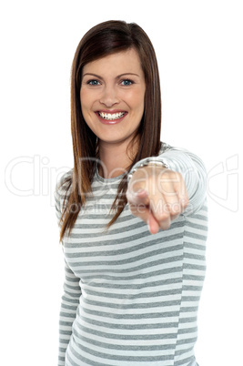 Woman pointing her finger towards the camera