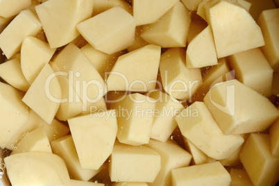 The diced potato tubers in water
