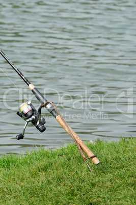 France, a fishing rod by a pond