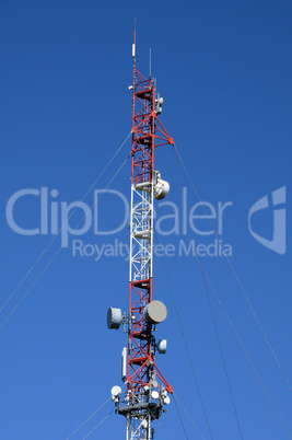 vertical picture of antennas on a pylon