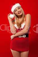 Laughing woman in a Santa costume