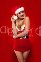 Sexy young blonde in a Santa Claus outfit