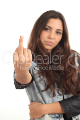 Teen girl showing middle finger