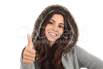 Teen girl with thumb up and smiling