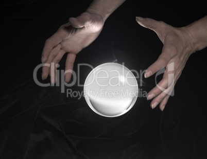 crystal ball and hands
