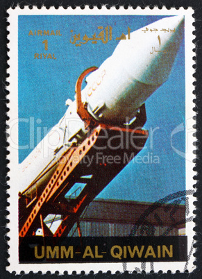 Postage stamp Umm al-Quwain 1972 Soviet Rocket being Erected