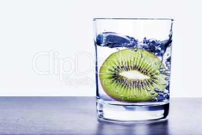 Glass of water with kiwi