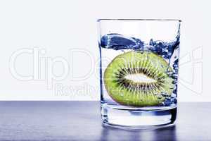 Glass of water with kiwi