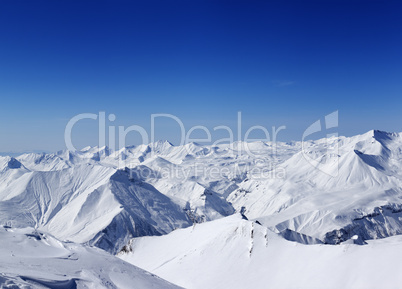 Panoramic view on snowy mountains in nice day