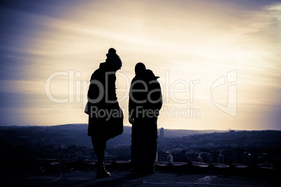 Silhouette of young couple  at sunset