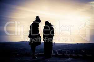 Silhouette of young couple  at sunset