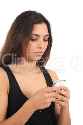 Teen girl sending a mobile message