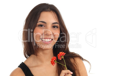 Teen girl with a flower smiling