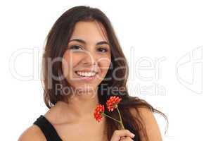 Teen girl with a flower smiling