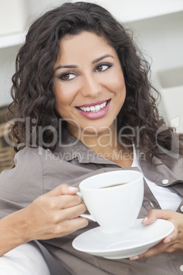 Happy Hispanic Woman Smiling Drinking Tea or Coffee