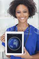 African American Female Doctor Tablet Computer World Map