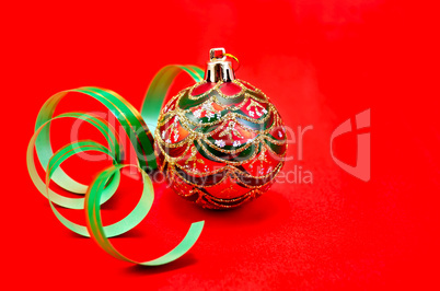 Christmas red ball with green ribbon