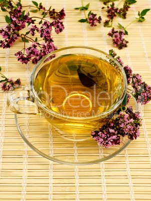 Herbal tea with oregano on bamboo