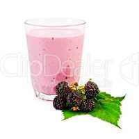 Milkshake with a blackberry and a leaf
