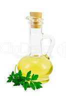Vegetable oil in a carafe with parsley