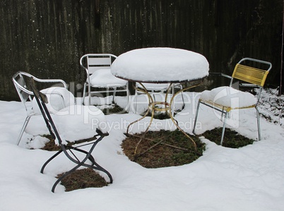 Snow Covered Chairs