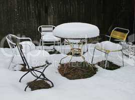 Snow Covered Chairs