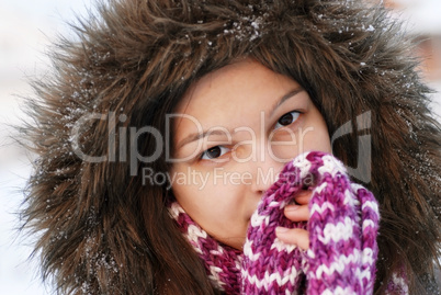 Smiling girl in hood