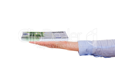 Hand holding bunch of banknotes