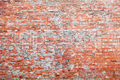 Red brick dirty background.