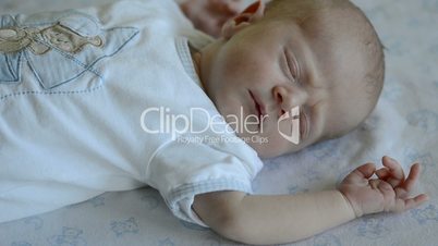 Cute baby sleeping and dreaming