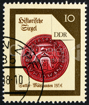Postage stamp GDR 1988 Muhlhausen Saddler, Seal from 1565